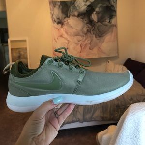 Olive green Nike running shoes